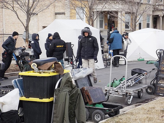 The Chicago Fire television series production crew prepares for an episode filmed last Friday between 38th and 39th Street along King Drive.  