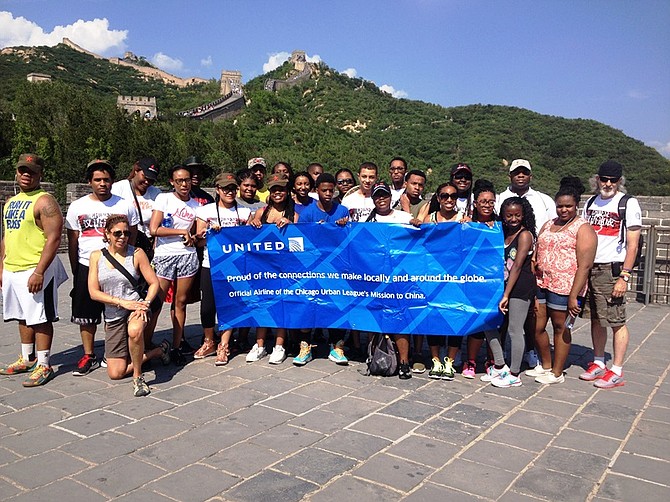Chicago Urban League high students and their chaperones pose for a picture while standing on the Great Wall of China whilst on the Chicago Urban League’s Student Mission to China.   The Chicago Urban League’s Student Mission to China gives African American youth from underserved communities a global perspective on their lives and communities and empowers them to see themselves as part of a global community.