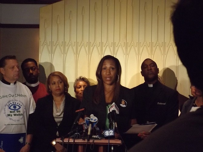 Pamela Montgomery-Bosley, whose son, Terrell, died in gun-violence several years ago, spoke Tuesday at news conference about a lawsuit targeting three suburbs over gun regulations. 