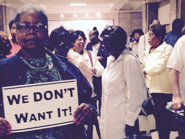 Chatham residents wait to attend a Chicago Zoning Board of Appeals meeting last week about a proposed medical marijuana dispensary slated to open in their neighborhood.