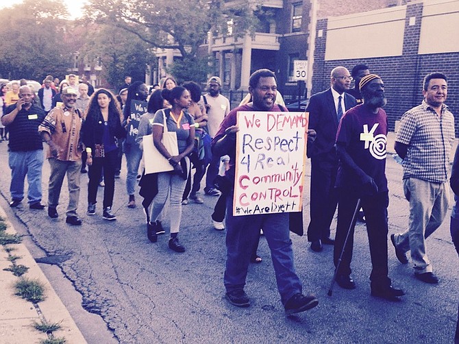 Protesters march from Dyett High School to President Barack Obama's home in the Kenwood neighborhood in Chicago to attempt to get support for a school that specializes in science. 