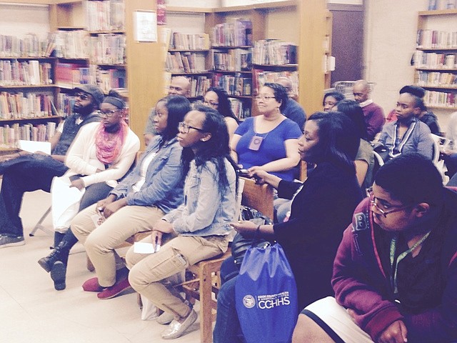 High school parents and students attend a seminar on college finances by a representative of Ada S. McKinley Community Services. The college fair was Saturday at Tuley Fieldhouse, 501 E. 90th Pl. 