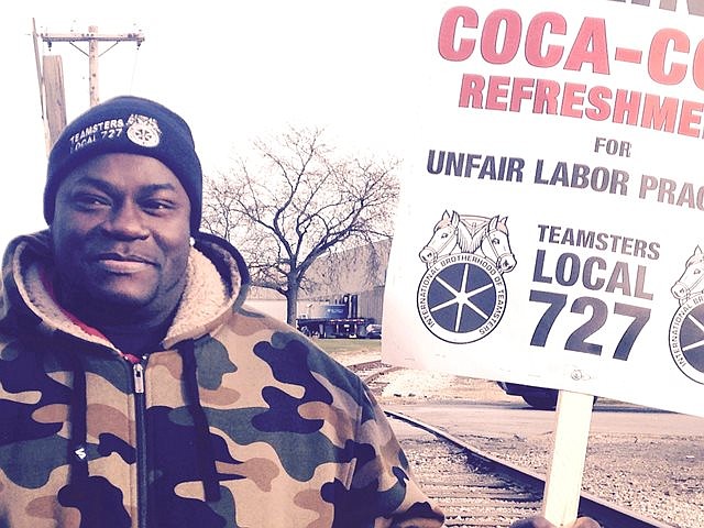 Larry Spencer is a striking worker at the Coca-Cola plant in south suburban Alsip, Ill.  For the last six years, he has worked at the plant at 12200 S. Laramie Ave.  Strikers are seeking improvements in wages, health care and improvements in scheduling.