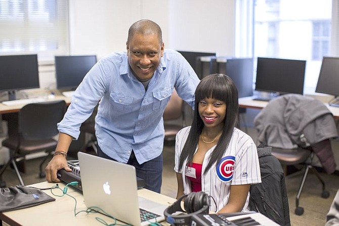 Joelle Israel of Rogers Park absorbing the knowledge of Greg “Stryke” Chin of The GRAMMY Foundation at Best Buy GRAMMY Camp– Weekend, powered by Chicago City of Learning.