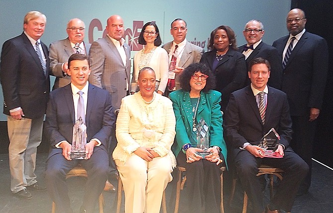 Members of ComEd pose with award recipients during the company's 1st Inaugural Supplier Diversity Awards event held on April 4, 2016 at the Bridgeport Art Center located at 1200 W. 35th Street in Chicago.        
Back row (left to right): Terry Donnelly, Executive Vice President and COO, ComEd; Guy Niedorkorn, Vice President, Aldridge Electric; Arthur Zayas Miller, President and CEO, MZI Group, Inc.; Anne Pramaggiore, President and CEO, ComEd; Mike Medina, VP Utility, MZI Group, Inc.; Michelle Blaise, Senior VP, ComEd Technical Services; Fidel Marquez, Senior VP, ComEd Government Affairs; Ralph Moore, President, Ralph G. Moore & Associates. Front row (left to right): David Shall, Executive VP, Choctaw-Kaul Distribution; Deborah M. Sawyer, Founder and CEO, Environmental Design Int’l; Loretta Rosenmayer, Founder and CEO, INTREN, Inc.; Chad Myers, Project Executive, Burling Builders, Inc.