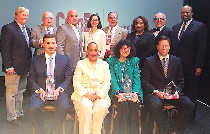 Members of ComEd pose with award recipients during the company's 1st Inaugural Supplier Diversity Awards event held on April 4, 2016 at the Bridgeport Art Center located at 1200 W. 35th Street in Chicago.        
Back row (left to right): Terry Donnelly, Executive Vice President and COO, ComEd; Guy Niedorkorn, Vice President, Aldridge Electric; Arthur Zayas Miller, President and CEO, MZI Group, Inc.; Anne Pramaggiore, President and CEO, ComEd; Mike Medina, VP Utility, MZI Group, Inc.; Michelle Blaise, Senior VP, ComEd Technical Services; Fidel Marquez, Senior VP, ComEd Government Affairs; Ralph Moore, President, Ralph G. Moore & Associates. Front row (left to right): David Shall, Executive VP, Choctaw-Kaul Distribution; Deborah M. Sawyer, Founder and CEO, Environmental Design Int’l; Loretta Rosenmayer, Founder and CEO, INTREN, Inc.; Chad Myers, Project Executive, Burling Builders, Inc.