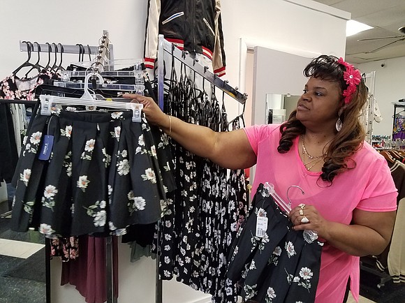 A professional model known for her fashion sense wants families in the Joliet area to realize they can dress and ...