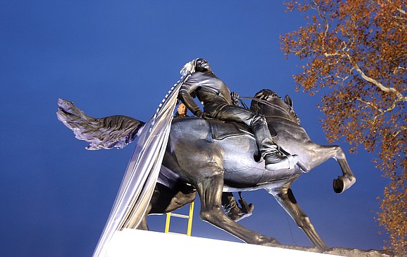 Kehinde Wiley’s monumental statue, “Rumors of War,” was unveiled Tuesday at its new home at the entrance of the Virginia ...