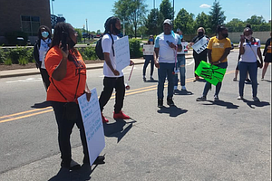 A rally was held in downtown Joliet on Sunday in response to the death of George Floyd after a Minneapolis Police officer kneeled on his neck for approximately eight minutes.