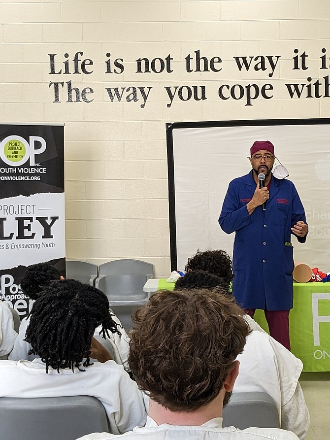 Dr. Michael McGee speaks to young people at Lake County Juvenile Detention Center during POP on Youth Violence’s Peace, Unity & Love Tour. Photo provided by Dr. Michael McGee.