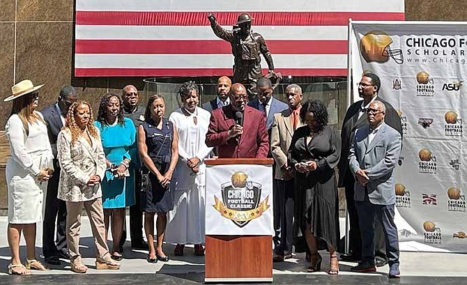 Larry Huggins, co-founder of the Chicago Football Classic, along elected officials during a press conference about the Chicago Football Classic. PHOTO PROVIDED BY CHICAGO FOOTBALL CLASSIC.