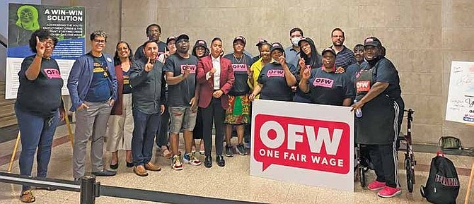 Supporters of One Fair Wage, along with 26th Ward Alderman Jessie Fuentes at City Hall. PHOTO PROVIDED BY ONE FAIR WAGE.