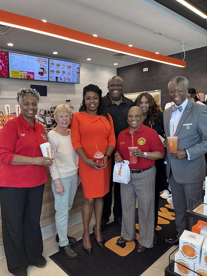 Pictured at the Dunkin Donuts grand opening celebration is Lynwood's Mayor Jada D. Curry the village Clerk, and Trustees. Photo provided by STH Media LLC.