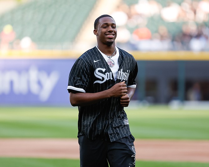 University of Illinois Men’s Football Player Malik Elzy throws out the ceremonial first pitch at the Chicago White Sox vs. the Baltimore Orioles game. Elzy is part of CHISOX Athletes, a Name, Image and Likeness (NIL) program for student athletes. Photo courtesy of the Chicago White Sox.