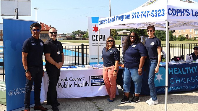 Chicago Department of Public Health (CDPH), Cook County Department of Public Health (CCDPH) and the U.S. Department of Housing and Urban Development (HUD) gathered with local leaders and area residents Saturday, July 27, at Mason Elementary School, 4217 W. 18th St., Chicago, IL, to celebrate the success of their lead abatement programs. Both health departments provide lead removal services and home upgrades to eligible renters and homeowners at no cost.
Featured left to right: Dr. LaMar Hasbrouck, CCDPH chief operating officer; Jason Applegate, CCDPH manager of Lead Poisoning Prevention; Michelle Medeiros,
HUD deputy director, Office of Lead Hazard Control and Healthy Homes ; Sharita Webb, CDPH director of public health operations; and Jennifer Vidis,
CDPH deputy commissioner. Photo by Cook County Department of Public Health