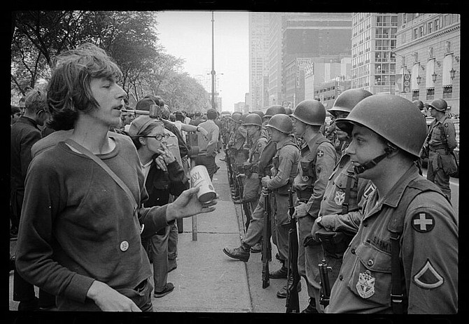 Vietnam War protesters and National Guard soldiers face off outside the 1968 Democratic National Convention near Grant Park in Chicago. (Photo: Warren K. Leffler/Library of Congress)