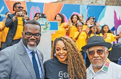 Mayor Brandon Johnson, with Polished Pebbles Founder Kelly Fair and Local Author and Historian Pemon Rami during the launch of South Side Sanctuary. PHOTO BY KORY POWELL.