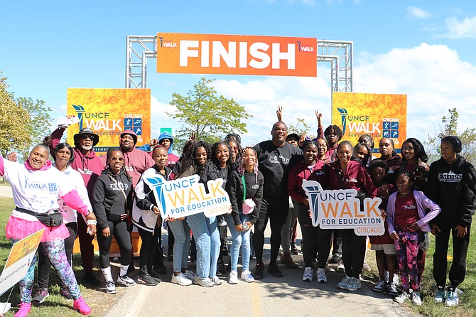 UNCF Walk for Education teams celebrate at the finish line.