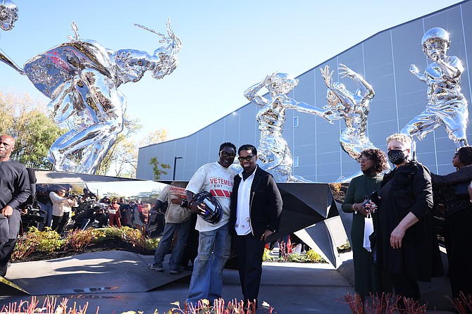 Sculptor Abiola Akintola and Pastor John Hannah at the unveiling of The Movement. PHOTO PROVIDED BY D. WILLIAMS PUBLIC RELATIONS & EVENT MANAGEMENT GROUP.