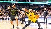 VCU's Zeb Jackson (2) gets past George Mason's K. D. Johnson (0) as the VCU Rams defeat the George Mason Patriots (70-54) at the Siegel Center Saturday, Feb. 22, 2025.  (photo by James Haskins)