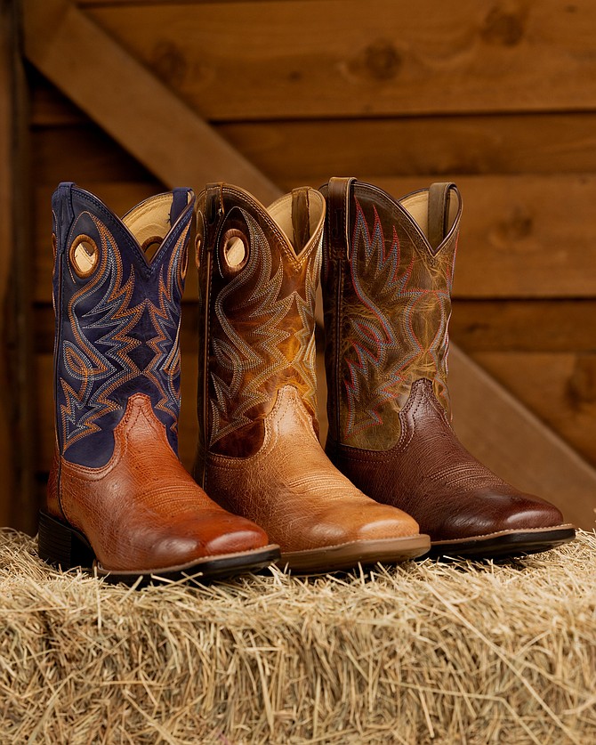 Justin's Roswell 11" Smooth Ostrich Boot in brandy and cognac and the Conroe 11" Smooth Ostrich Boot in kango tobac. Justin Boots