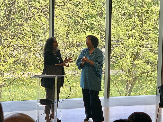 Dorri McWhorter receives the Impact Award from Sharon Grant, , Executive Director, Community Programs Accelerator, Office of Civic Engagement. Photo by Tia Carol Jones.