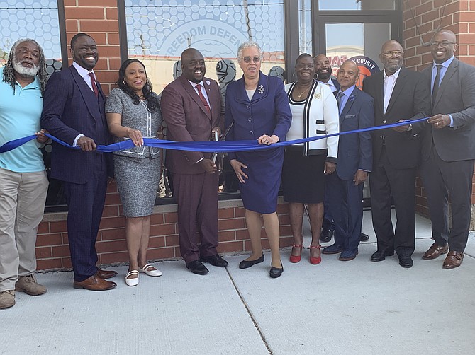Community stakeholders and elected officials during the ribbon cutting for the Freedom Defense Center of Roseland. Photo by Tia Carol Jones.