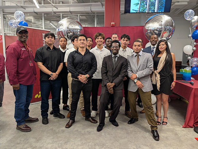 The 44th cohort of Overhead Electric Line Workers program participants celebrated completing the program. Photo provided by City Colleges of Chicago.