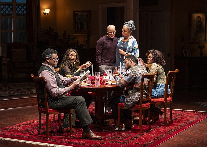 (clockwise from left) Harry Lennix, ensemble members Alana Arenas and Glenn Davis, Tamara Tunie, Ayanna Bria Bakari and ensemble member Jon Michael Hill in Steppenwolf Theatre Company’s world premiere of Purpose by Branden Jacobs-Jenkins, directed by Phylicia Rashad. Photo by Michael Brosilow.