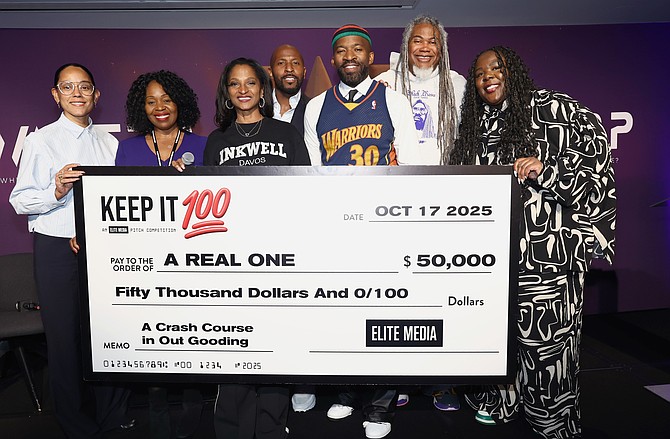 Announcing the winner of the first-ever "Keep It 100" Pitch Competition sponsored by Elite Media. Photo credit: Arturo Holmes