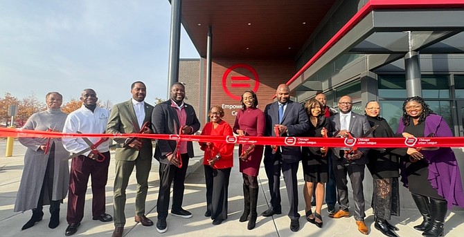 Community stakeholders and elected officials cutting the ribbon on the Chicago Urban League Empowerment Center in Chatham. Photo by Lanette L. Warbington.