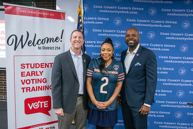 (From left) High School District 214 Superintendent Dr. Scott Rowe, Cook County Clerk Monica Gordon, and Ted Crews, Special Advisor to the President and CEO and Chief Administrative Officer of the Chicago Bears, pose with students during an Election Judge training at John Hersey High School in Arlington Heights. Photos provided by STH Media