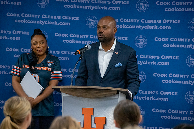 (Podium / Speaking): Ted Crews, Special Advisor to the President and CEO and Chief Administrative Officer of the Chicago Bears, speaks to students during an Election Judge training at John Hersey High School as part of the Cook County Clerk’s Office’s High School Early Voting Program. Clerk Monica Gordon looks on. Photo provided by the Cook County Clerk’s office.