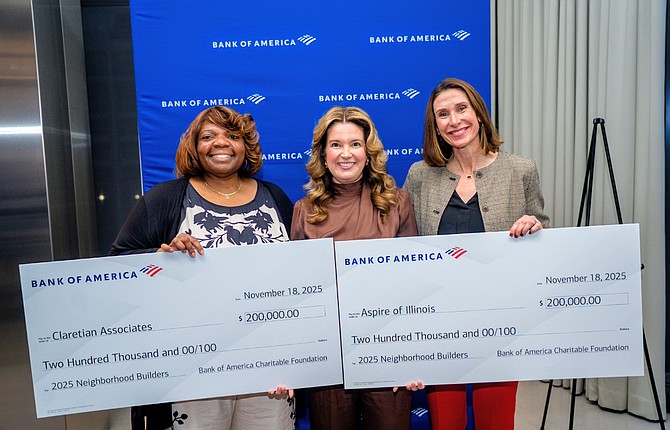 Angela Hurlock, CEO of Claretian Associates, accepts a check as part of the organization being named a Bank of America 2025 Neighborhood Builder. Photo provided by Bank of America.