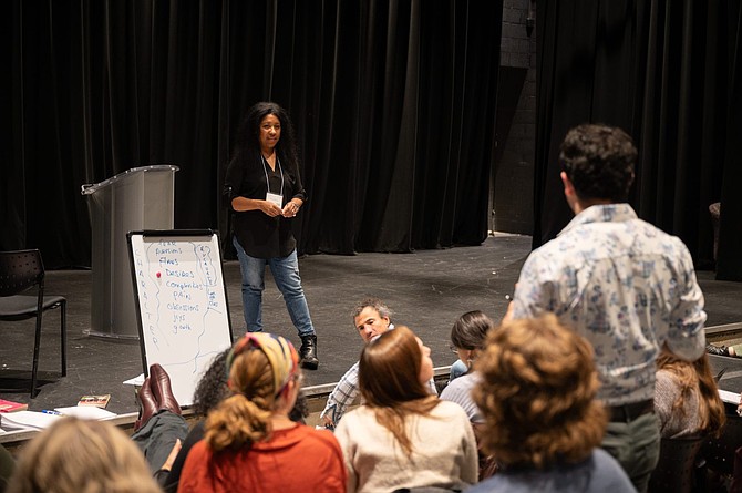 Dionna Griffin-Irons (center) teaching a class, courtesy of Stories Matter Foundation.