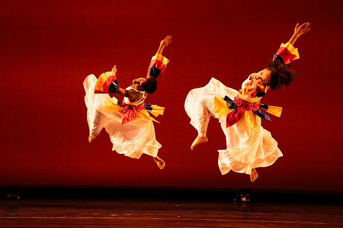 Red Clay Dance Company performs HER WOMB: Crucified, Conceived, Crescent, Congo... the Gathering, choreographed by Michelle Gibson, at Harris Theater during the 2024 La Femme Dance Festival. Photo by MReid Photography, courtesy of Red Clay Dance Company.