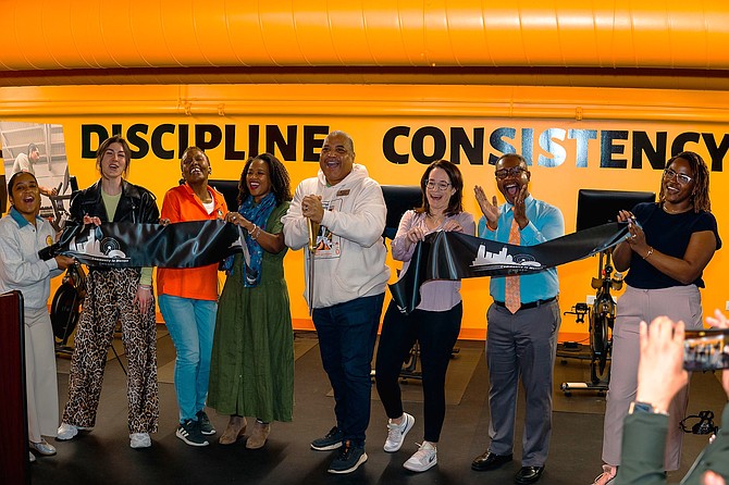 The Auburn Gresham community is now the home to a new life-changing fitness hub.  The Peloton company as well as members of the GAGDC’s team cut the ribbon on the new ‘Community In Motion’ Healthy Lifestyle Hub.  Photo by Julian Sanchez.