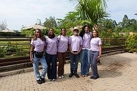 Howard faculty member John Tharakan, Ph.D., traveled to Kenya with students (left to right) Karma Parsons, Esra Omar, Monica Maya, Soya Pearson and Halayah Vann help supply water to a rural community.  Source Howard University