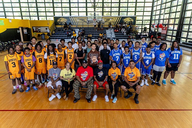 It takes a village to evoke change. Members of ‘The Support Group’ pose with team players before their 2026 Annual Basketball event. Photo courtesy of “The Support Group’.
