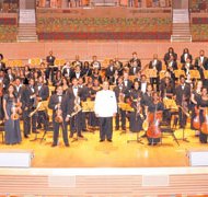 Inner City Youth Orchestra of Los Angeles
The music of such diverse geniuses as Michael Jackson, Beethoven, Nikolai Rimsky-Korsakov and Jerome Moross will be featured as part of the 5th Annual Season Ending Concert of the Inner City Youth Orchestra of Los Angeles (ICYOLA) at 3 p.m. on Sunday, July 7, at the Walt Disney Concert Hall in downtown Los Angeles. The orchestra has played for a private reception for first lady Michelle Obama, a dinner honoring Oprah Winfrey, an NAACP National Convention, and for the swearing-in ceremonies for both Supervisor Mark Ridley-Thomas and District Attorney Jackie Lacey. The orchestra was established in the summer of 2009 at the urging of eight African American young instrumentalists and is comprised of young people from the various inner city and minority communities of Los Angeles County. The orchestra numbers about 125 middle-school, high school and college-age young people. Conductor Charles Dickerson, center, is founder and music director. To RSVP, call (323) 292-7006.