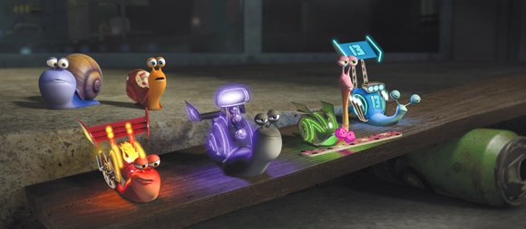 Turbo (center, back, played by Ryan Reynolds) and his brother Chet (Paul Giamatti) meet the Racing Snails (from left): Burn (Maya Rudolph), Whiplash (Samuel L. Jackson), Smoove Move (Snoop Dogg) and Skidmark (Ben Schwartz).