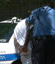 Police in Houston find 'prison room,' up to 8 possibly held captive
Texas authorities are investigating whether eight people were held captive for years in a north Houston house, with some perhaps dwelling in what has been described as a "prison room." Pictured is a person who has been detained for questioning.