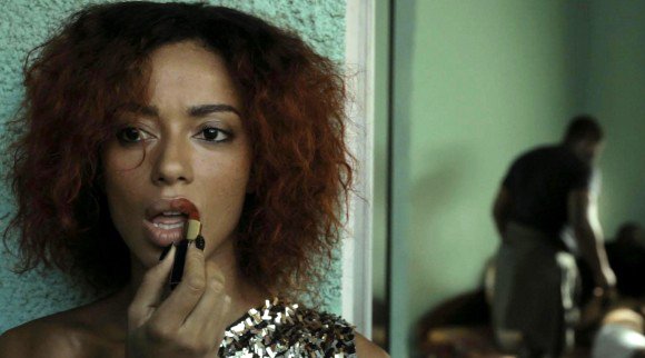 Manie Malone as Nora in "Viva Riva!"