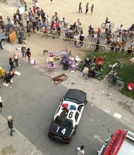 Hit-and-run driver plows into Venice Beach Boardwalk
Venice Beach, California A hit-and-run driver plowed into the crowd on the Venice Beach Boardwalk intentionally Saturday, August 3, 2013, hitting 12 people before ditching his car and running away. One person later died, Los Angeles police Lt. Andy Neiman said. Another was in critical condition, and two more in serious condition, officials said.