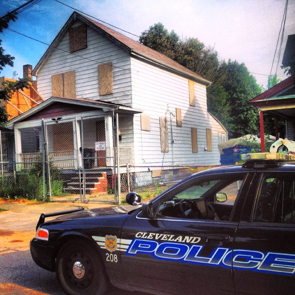 Ariel Castro's boarded up house before it was demolished, Wednesday, August 7, 2013.