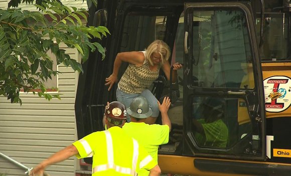 Demolition of Ariel Castro's house began around 7:30 a.m. Wednesday, August 7, 2013, as an aunt of another former Castro captive, Georgina DeJesus, made the first hit on the house, operating a hydraulic excavator with assistance.