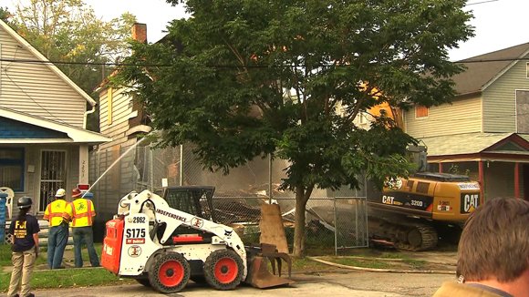 Workers began tearing down Ariel Castro's house of horrors where he held three women captive for years on Wednesday, August 7, 2013. Castro forfeited the house on Seymour Avenue as part of a plea deal with prosecutors that took the death penalty off the table in exchange for a life sentence, plus 1,000 years in prison.