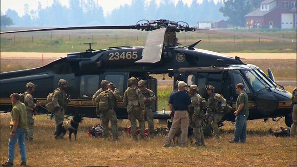 A crew prepared to search an area near Morehead Lake, Idaho. A massive manhunt that spanned 1,000 miles ended in gunfire in the Idaho wild late Saturday afternoon, August 10, 2013, — shots that ended the life of the family friend who was suspected of abducting 16-year-old Hannah Anderson and killing her mother and brother. The teenager was rescued near Morehead Lake, Idaho, where an FBI tactical agent killed her alleged kidnapper, James DiMaggio, around 5:20 p.m (7:20 p.m. ET), authorities said.