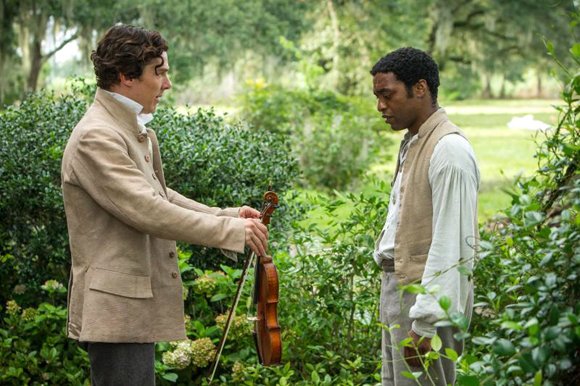 Benedict Cumberbatch as "William Ford" and Chiwetel Ejiofor as "Solomon Northup" in Steve McQueens's “12 Years A Slave."