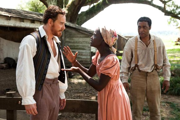 Michael Fassbender as "Edwin Epps," Lupita Nyong'o as "Patsey" and Chiwetel Ejiofor as "Solomon Northup" in Steve McQueens's “12 Years A Slave.”